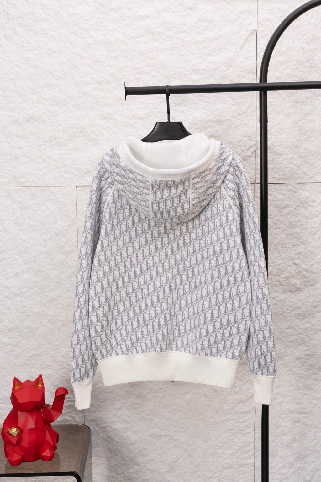 Dior hoodie with blue logo-knit texture, white hood and ribbed hem