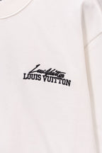 White long-sleeve sweatshirt with small Louis Vuitton logo on the front