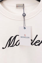 Moncler long-sleeve sweatshirt collar detail with size tag and Moncler script