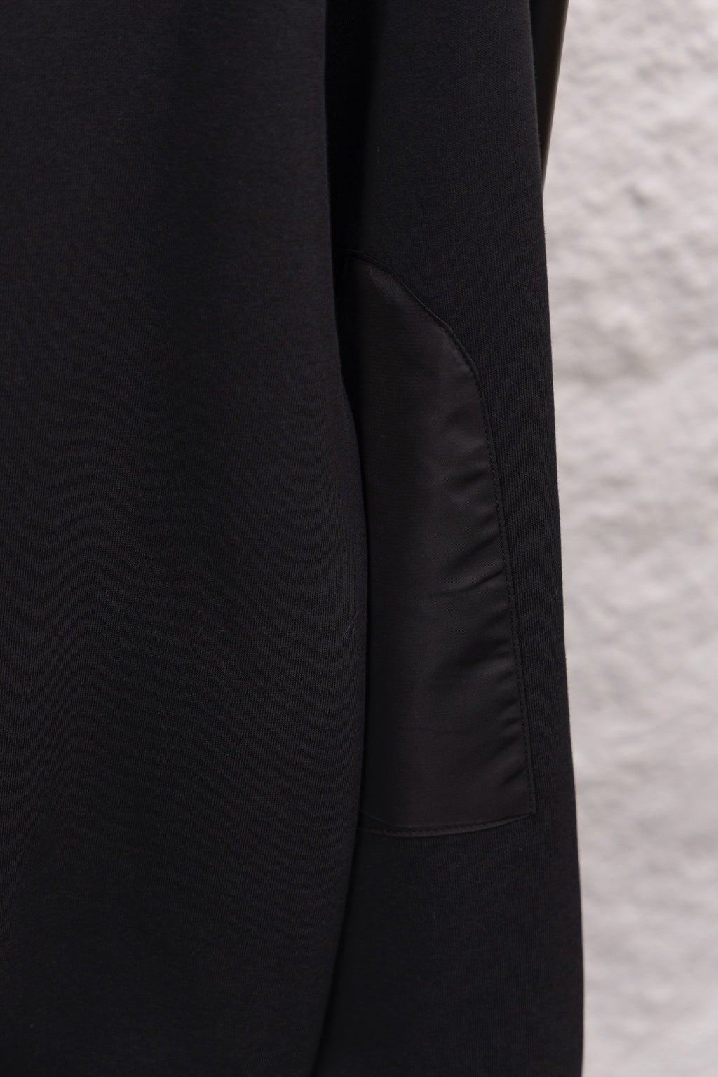 Prada sweatshirt side seam and panel detail on long-sleeve hem