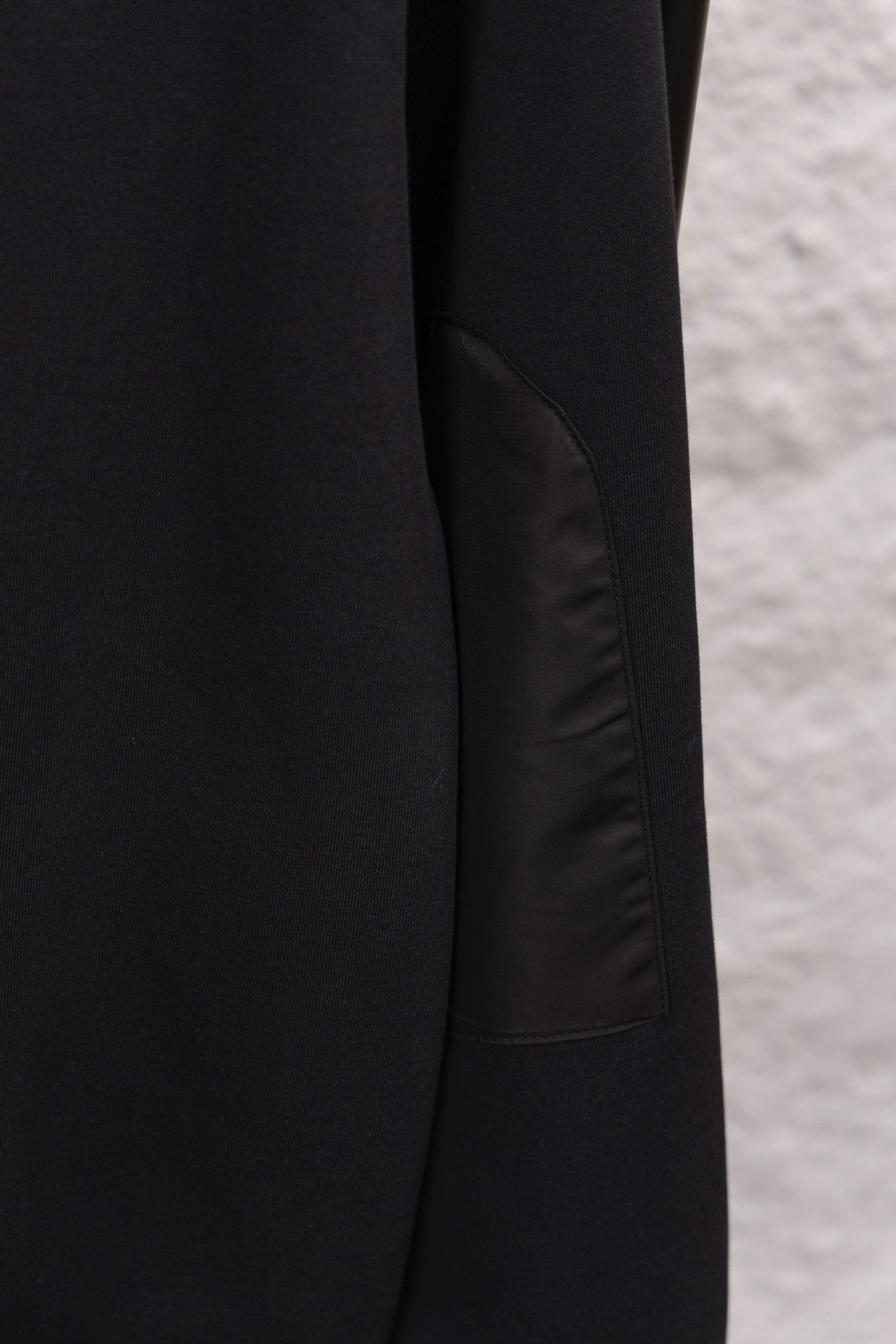 Prada sweatshirt side seam and panel detail on long-sleeve hem