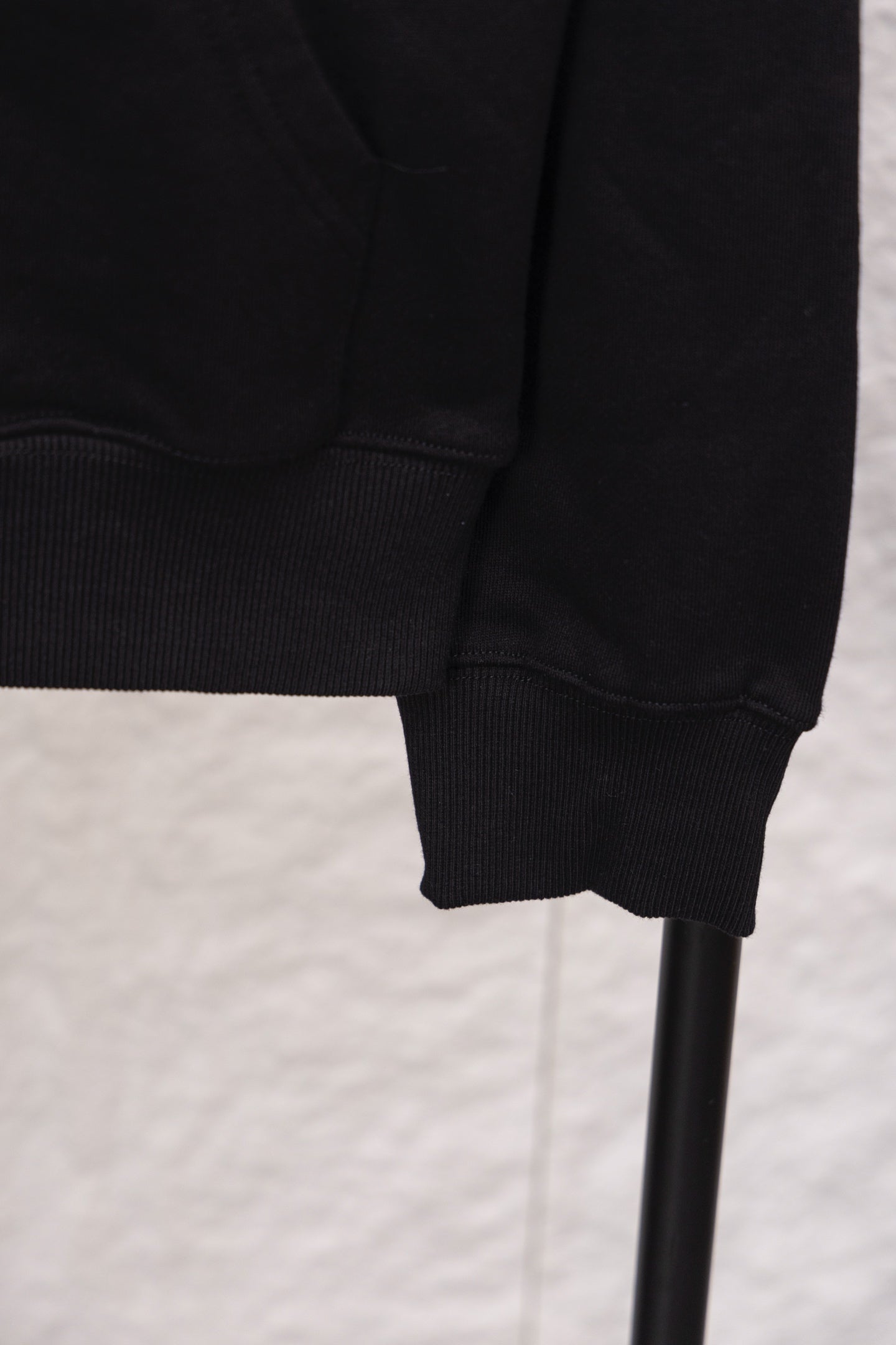Prada sweatshirt sleeve cuff and ribbed hem, close-up