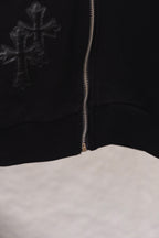 Black zip-up hoodie with cross graphic and front zipper