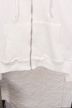White long-sleeve zip hoodie with silver zipper and front kangaroo pocket