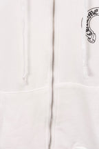 White zip-up hoodie close-up showing center zipper and drawstrings