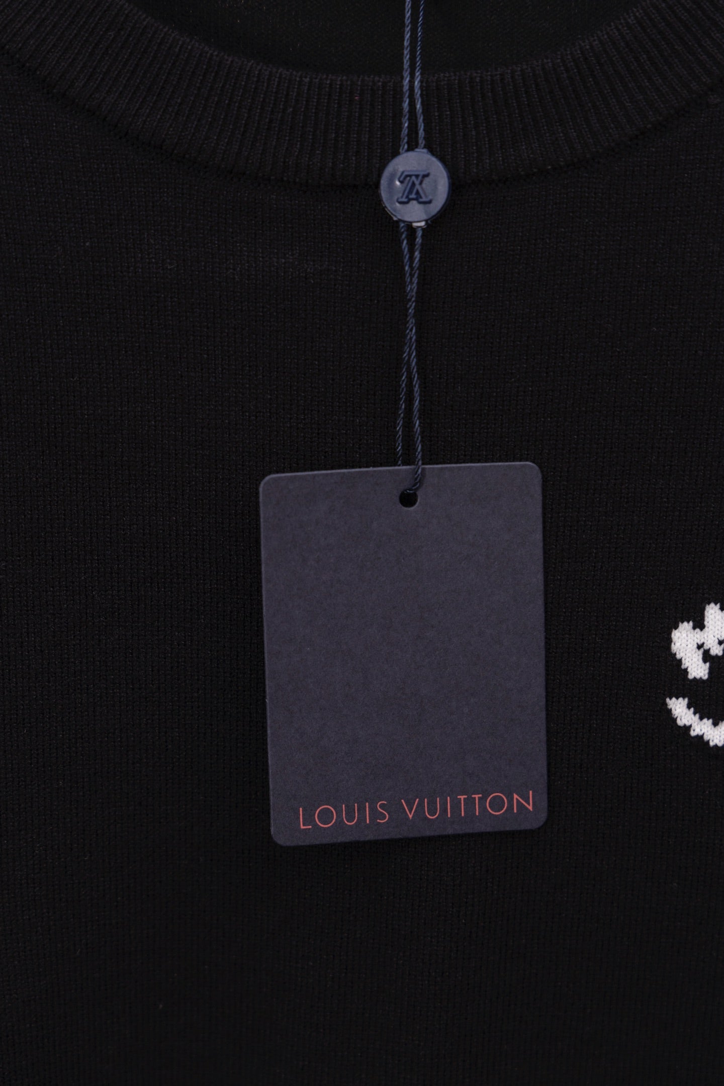 Black sweatshirt crew neck with hanging Louis Vuitton tag