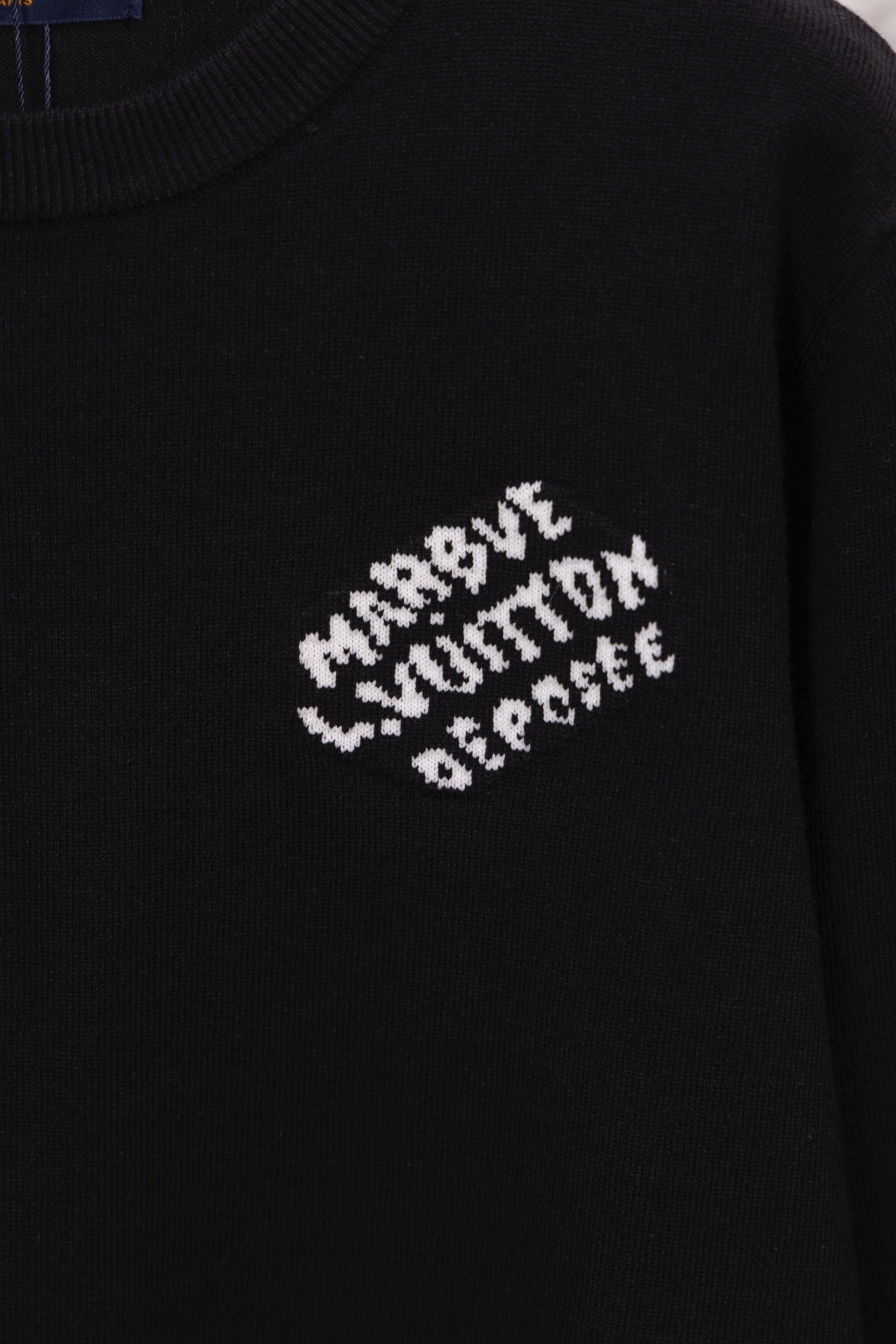 Black sweatshirt chest with white graphic logo text print