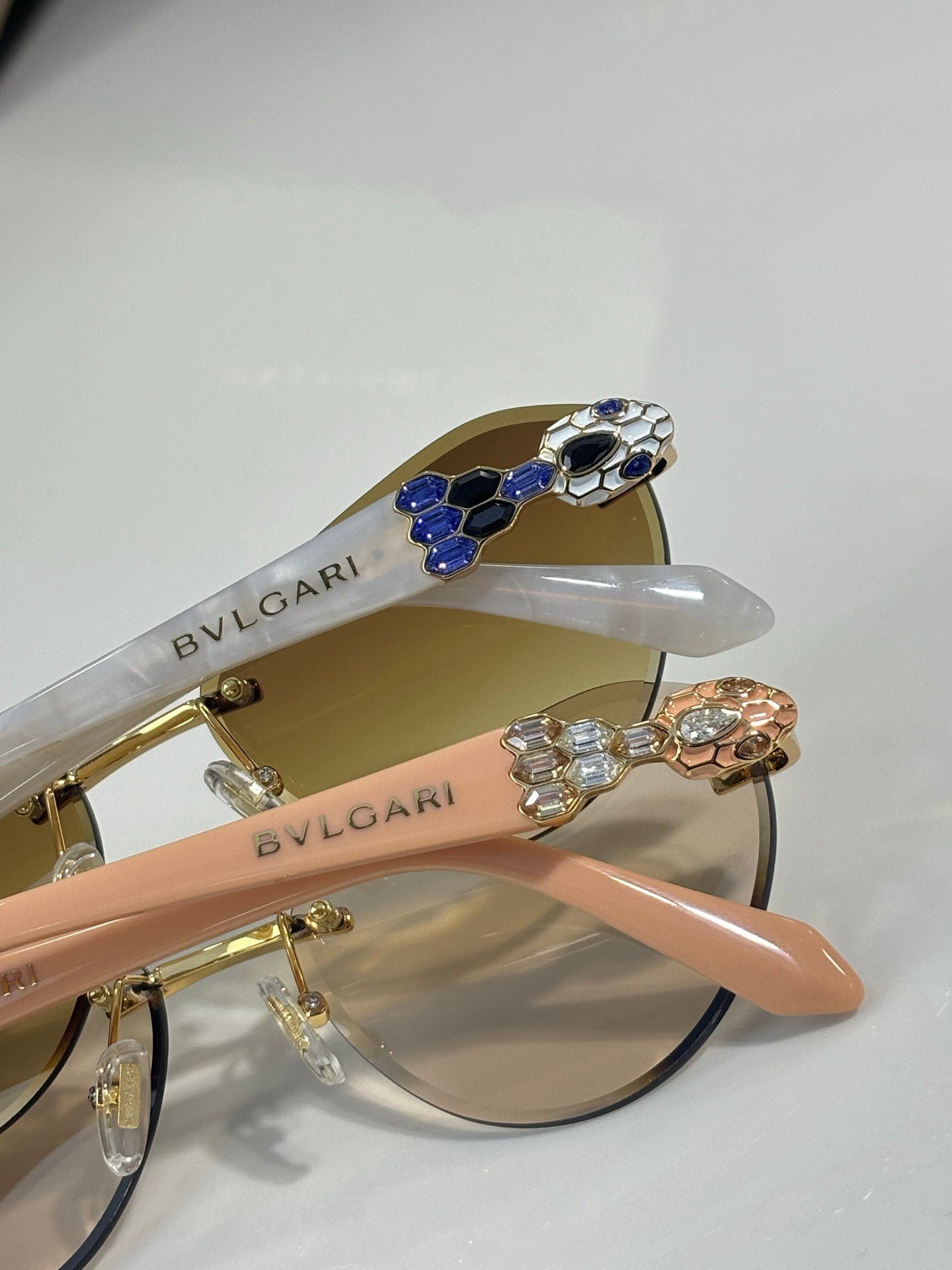 Bvlgari sunglasses close-up with jeweled hinge detail on gold-tone frames