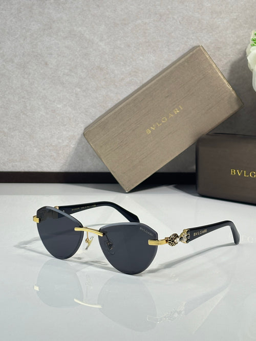 Bvlgari sunglasses with dark lenses and gold-tone metal bridge detailing