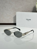 Silver-tone sunglasses with dark lenses and gold-tone logo detail