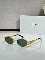 Gold-tone sunglasses with green lenses and detailed metal temples