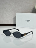 Black cat-eye sunglasses with dark lenses and gold-tone logo detail