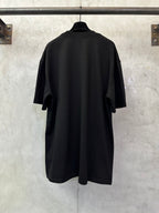 Black T-shirt, back view with short sleeves and relaxed fit
