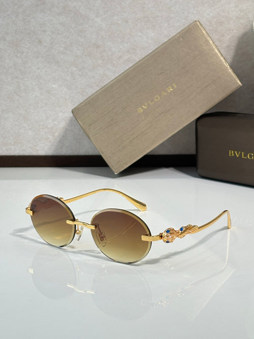 Bvlgari round sunglasses with brown lenses and gold metal frame