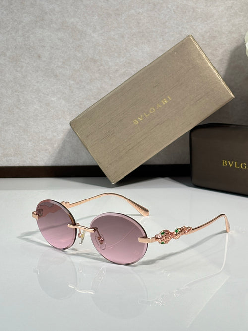 Bvlgari round sunglasses with pink lenses and rose-gold metal frame