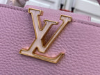 Louis Vuitton LV logo on light pink textured leather, gold-tone metal hardware