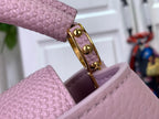 Louis Vuitton bag corner and handle clasp, light pink textured leather, gold hardware
