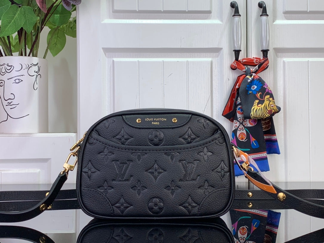 Louis Vuitton monogram crossbody bag, dark leather with embossed pattern, gold hardware