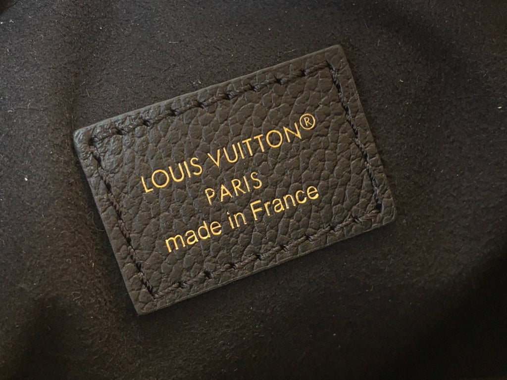Louis Vuitton leather patch: made in France, gold Louis Vuitton Paris text