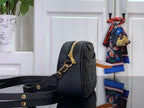 Louis Vuitton monogram crossbody bag, dark leather side view, gold clasp and strap
