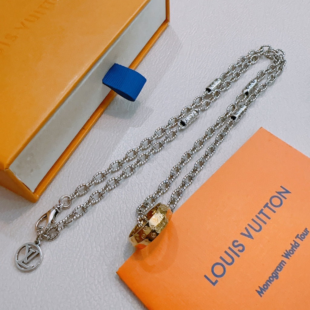 Silver-tone chain necklace set with ring and lock-shaped charms