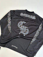 Chrome short long-sleeve jersey top back close-up with large logo graphic in dark charcoal