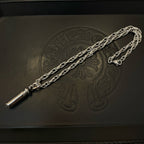 Chrome capsule pendant necklace with linked chain and clasp attachment