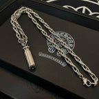Chrome chain necklace with capsule pendant and metal round end clasp