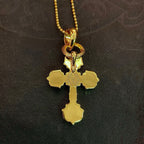 Gold tone cross pendant with loop clasp on beaded chain, hanging charm