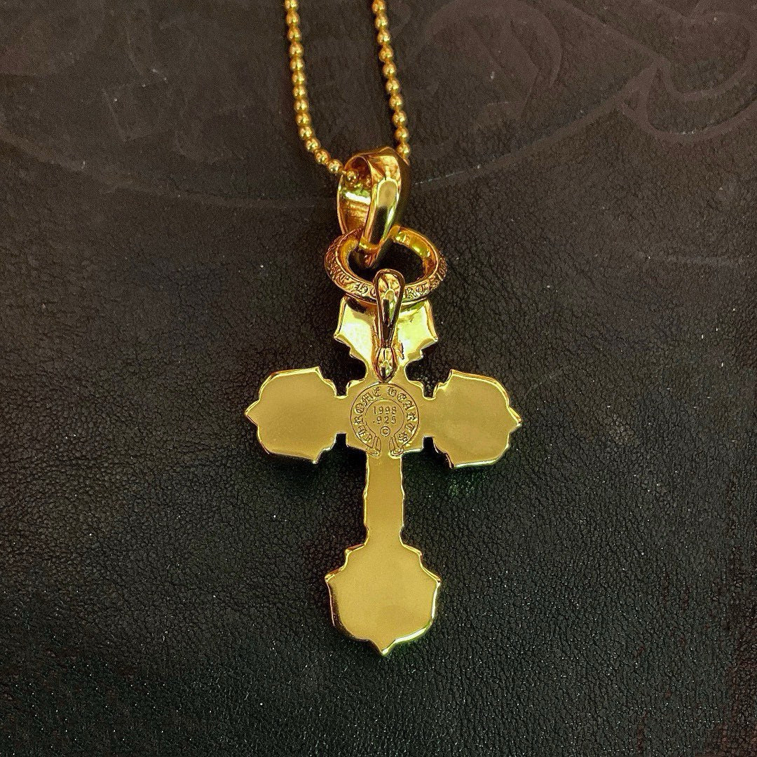 Gold tone cross pendant with loop clasp on beaded chain, hanging charm