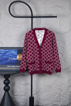 Gucci long-sleeve knit sweater in burgundy with repeating white GG pattern