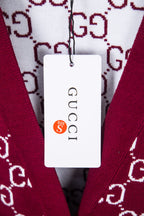 Gucci knit sweater with burgundy fabric and white GG pattern; size tag shows S