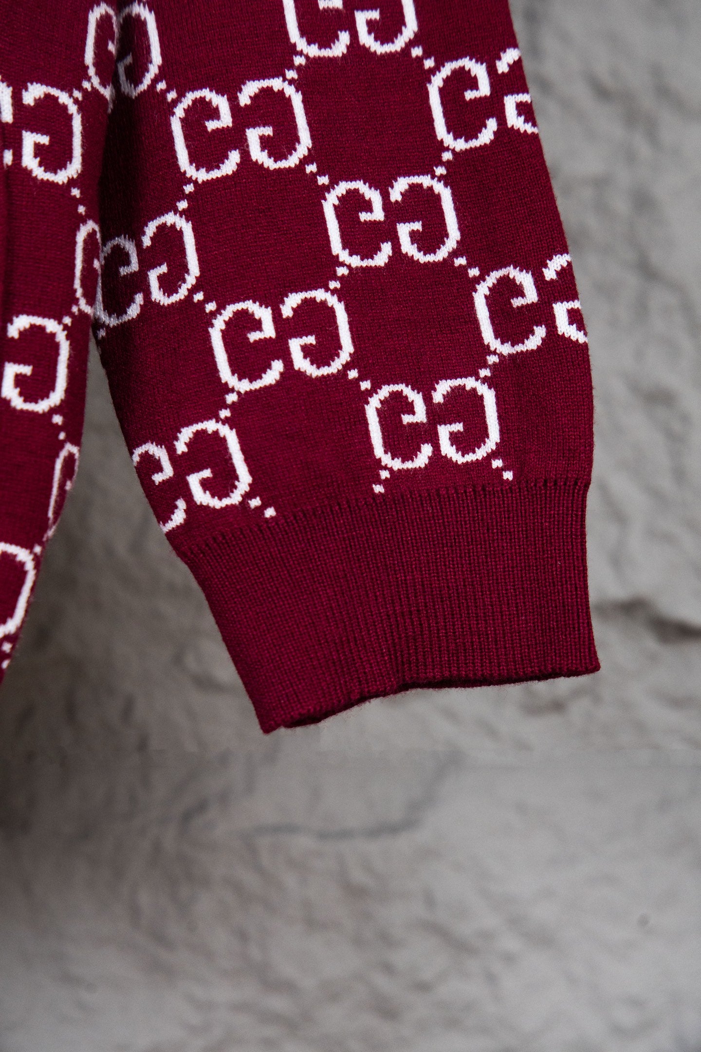 Gucci knit sweater lower sleeve section in burgundy with white GG monogram pattern