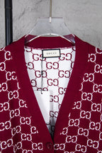 Gucci knit sweater neckline with burgundy V-shape trim and white GG monogram pattern