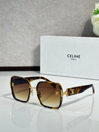 Celine sunglasses with tortoiseshell frames and brown gradient lenses, gold-tone logo