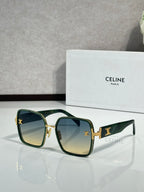 Celine sunglasses with dark green frames and gradient lenses, gold-tone logo on arms
