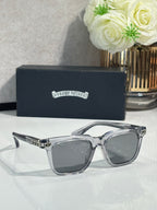 Chrome glasses with silver frame, gray lenses, decorative metal bridge detail