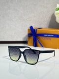 Louis Vuitton sunglasses, black frames, dark mirrored lenses with LV monogram