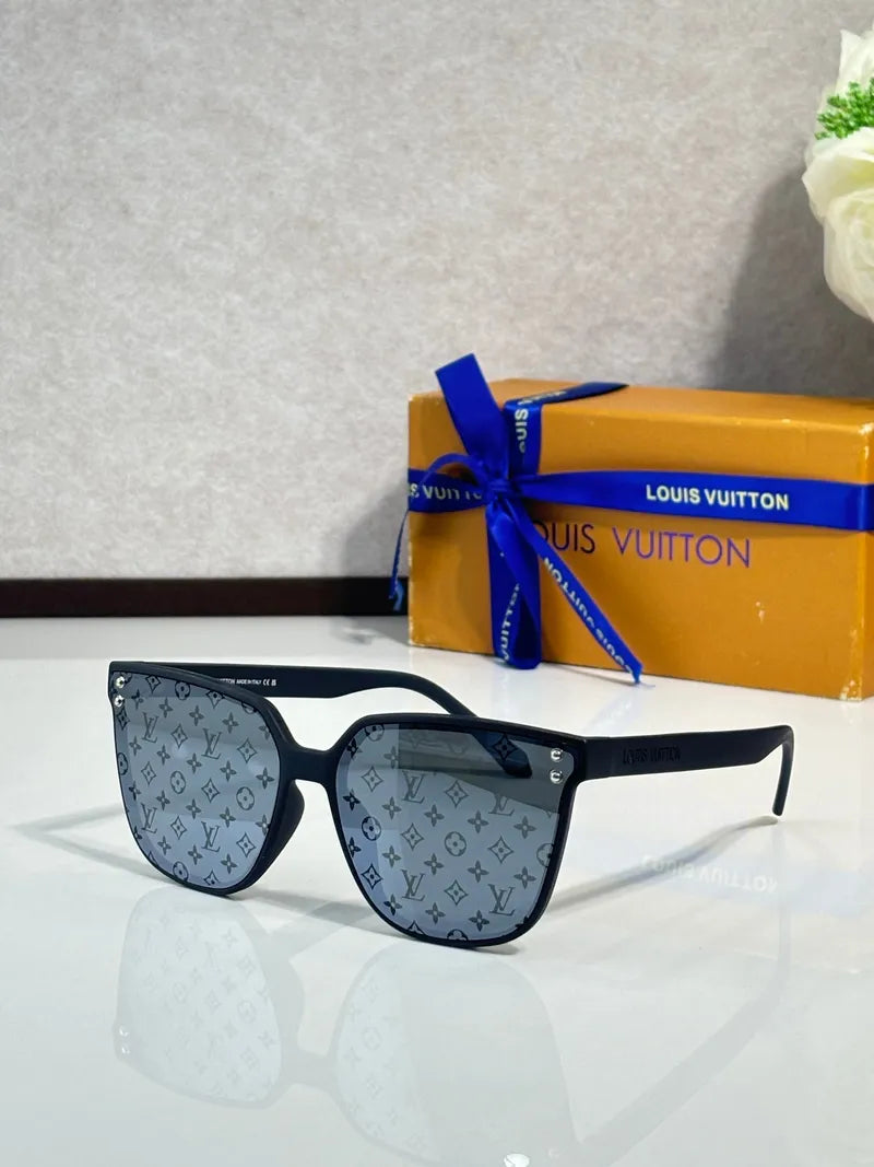 Gray monogram sunglasses with tinted lenses and dark blue square frames.