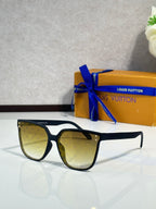 Louis Vuitton sunglasses, black frames, yellow tinted lenses