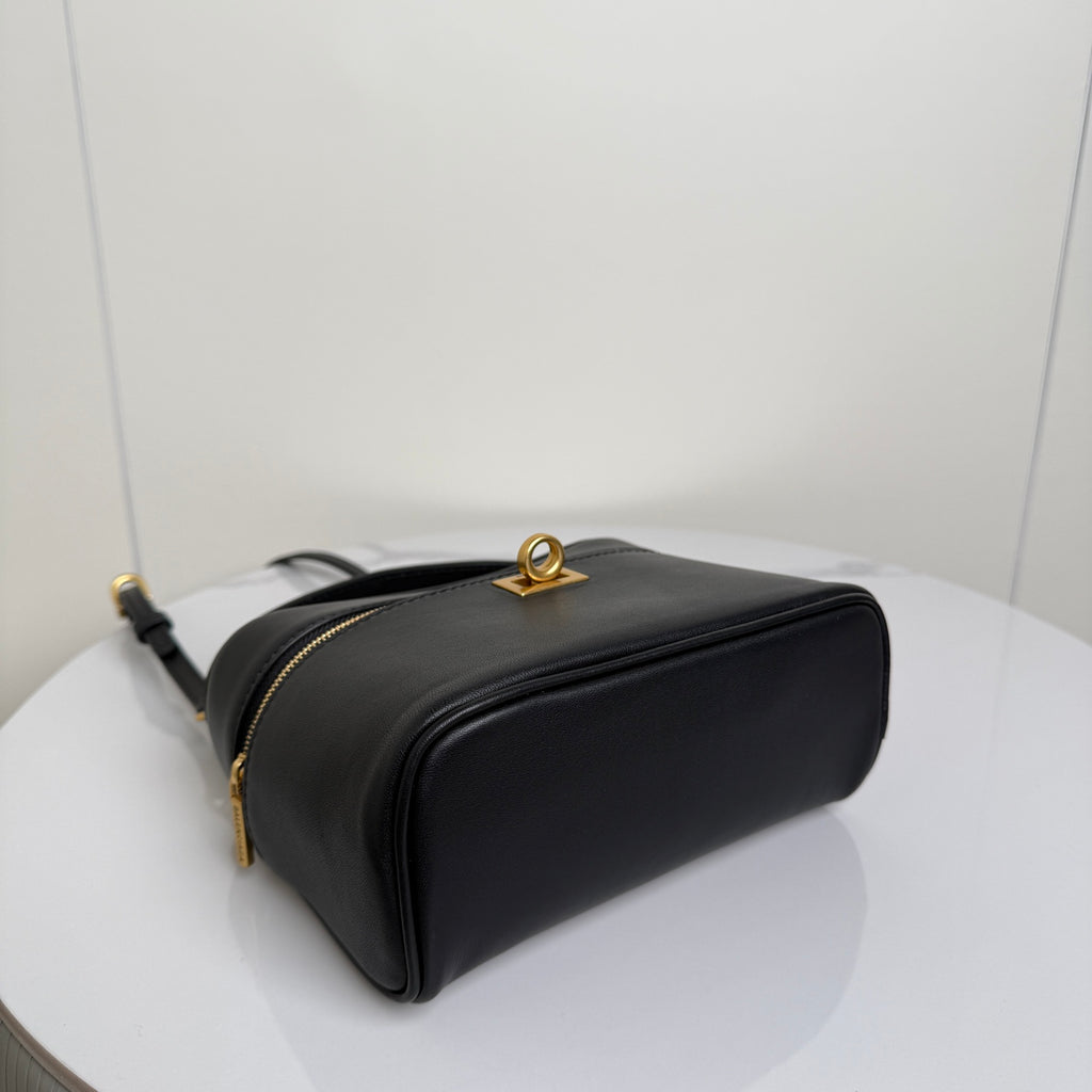 Balenciaga mini bag in black leather with gold top-ring and zipper closure