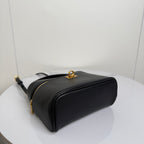 Balenciaga mini bag in black leather with gold top-ring and zipper closure