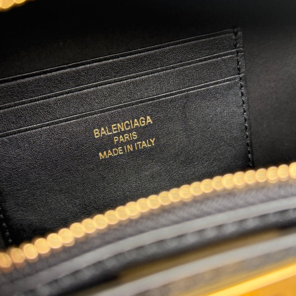 Balenciaga mini bag interior label showing BALENCIAGA PARIS MADE IN ITALY