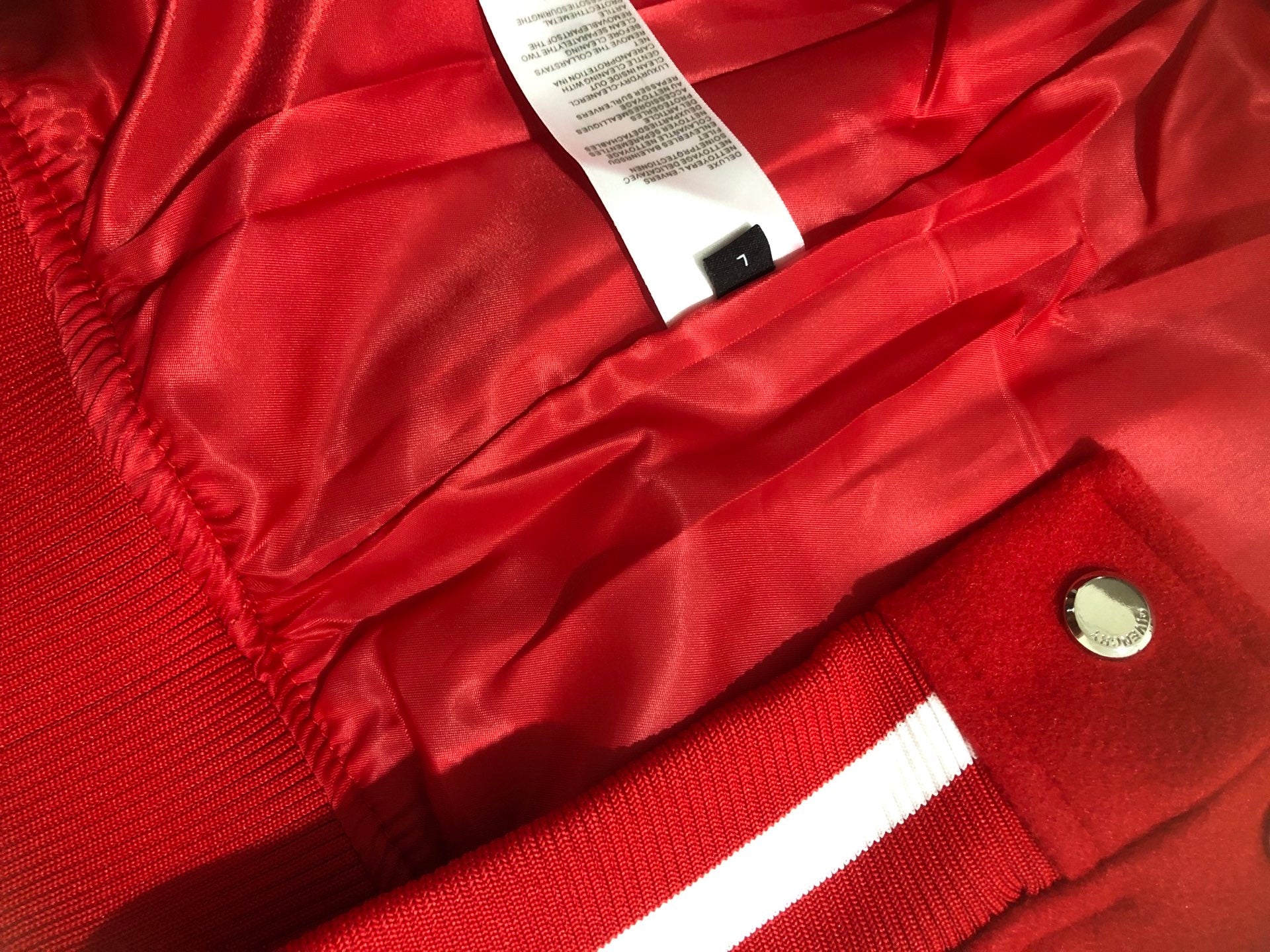 Givenchy red shiny lining with knit collar and small size label
