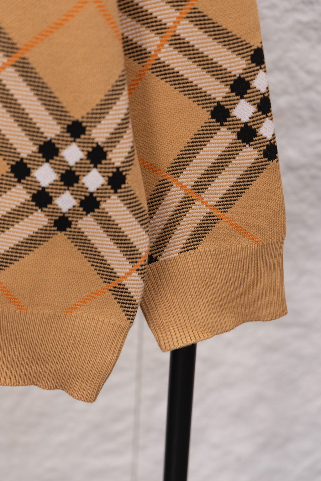 Burberry tan plaid cardigan hem and sleeves with ribbed cuffs