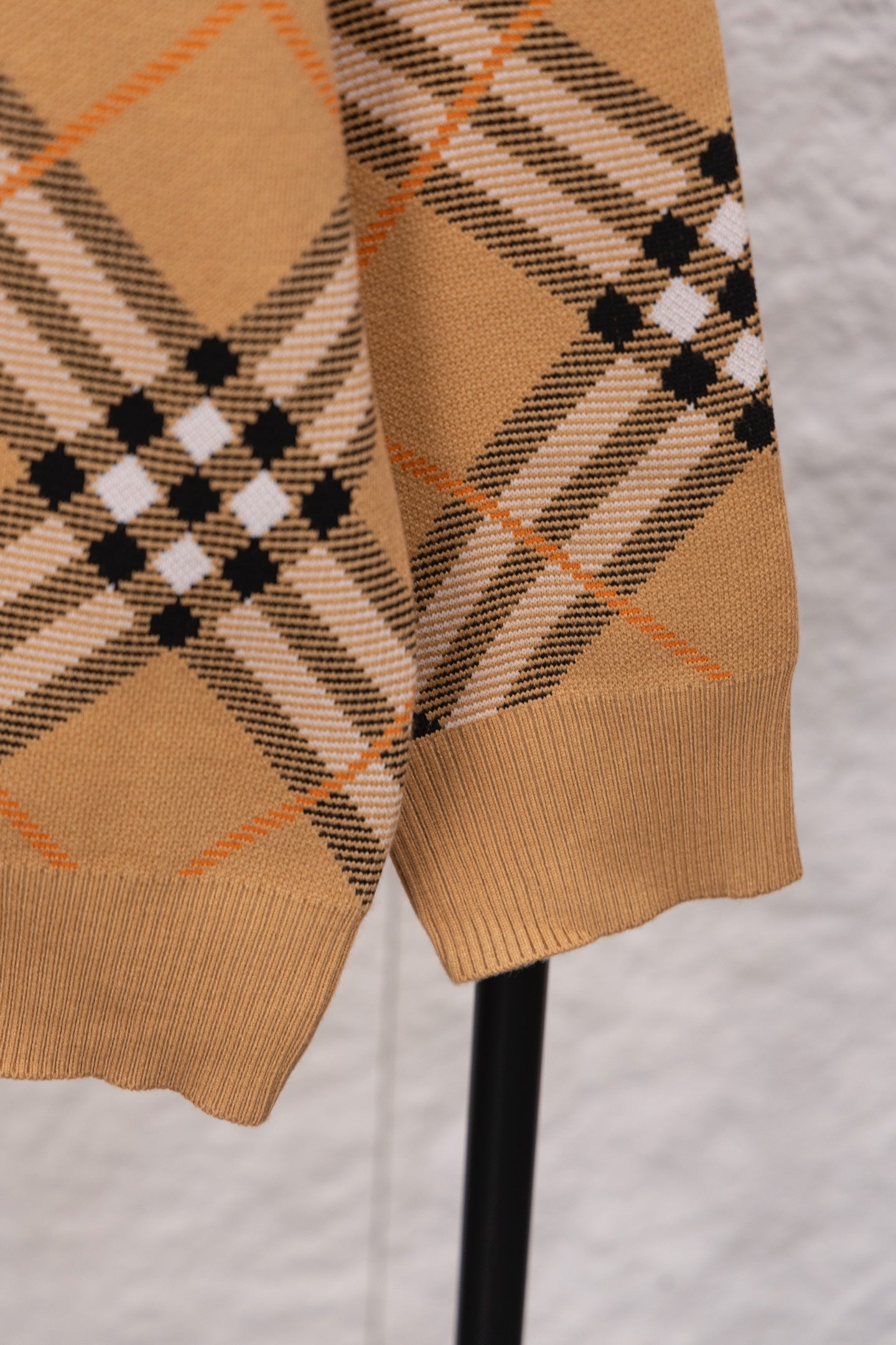 Burberry tan plaid cardigan hem and sleeves with ribbed cuffs