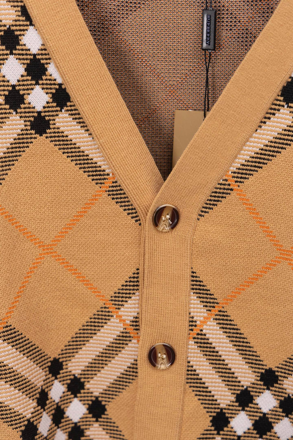 Burberry tan plaid cardigan center placket with metal buttons