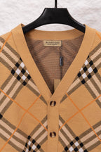 Burberry tan plaid cardigan V-neck with button placket and ribbed trim