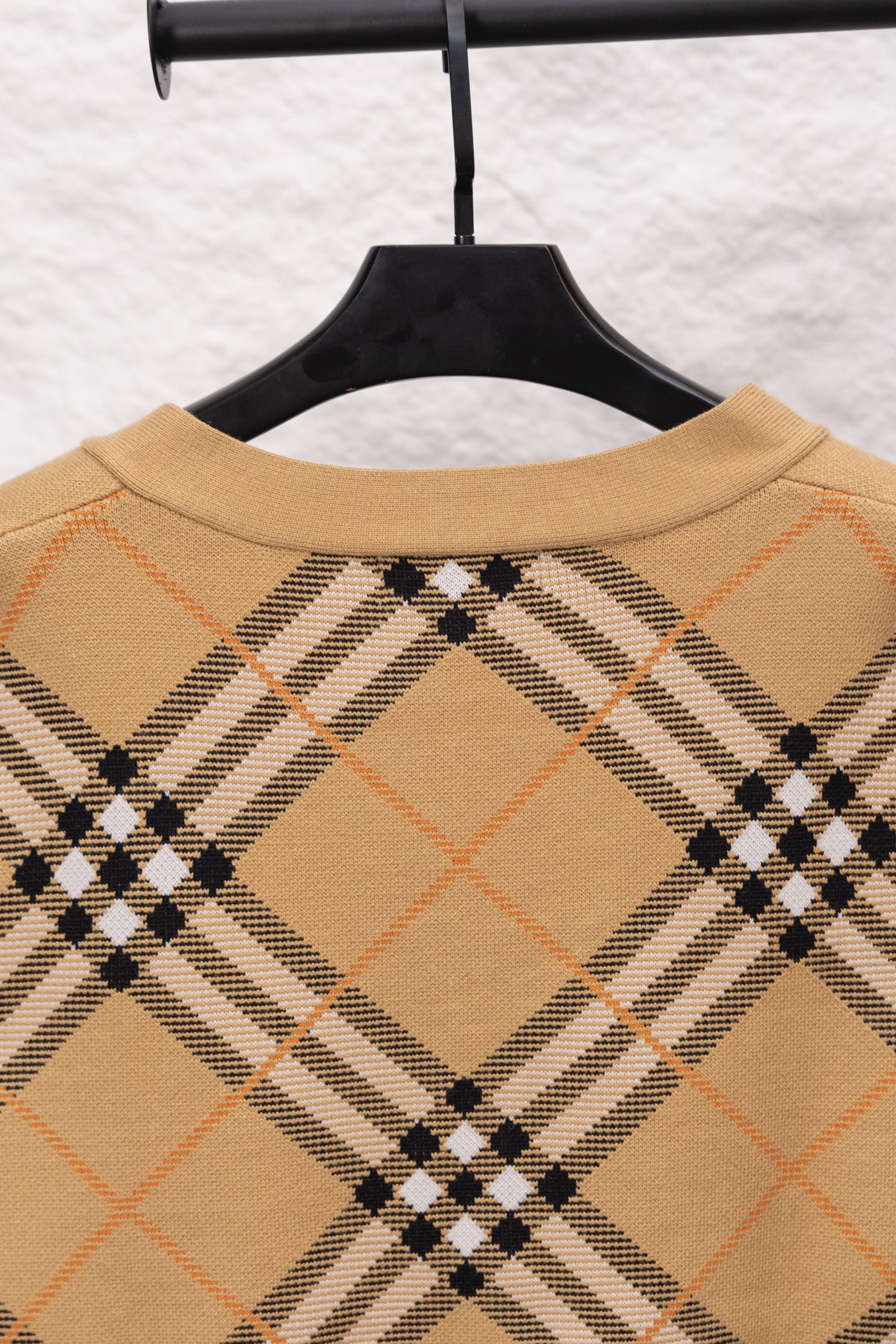 Burberry tan plaid sweater with ribbed crew neckline
