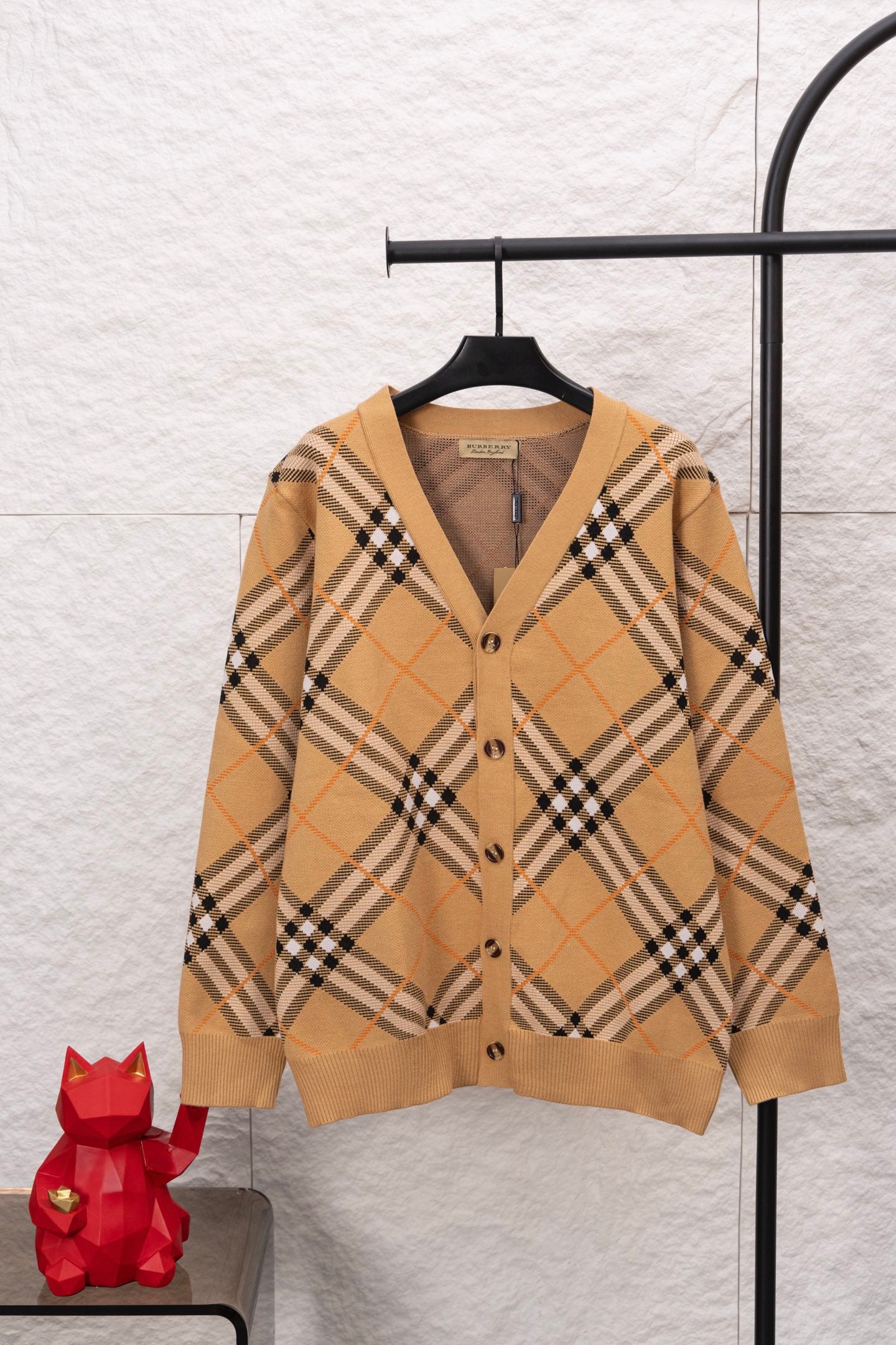 Burberry tan plaid cardigan with V-neck, button front, long sleeves